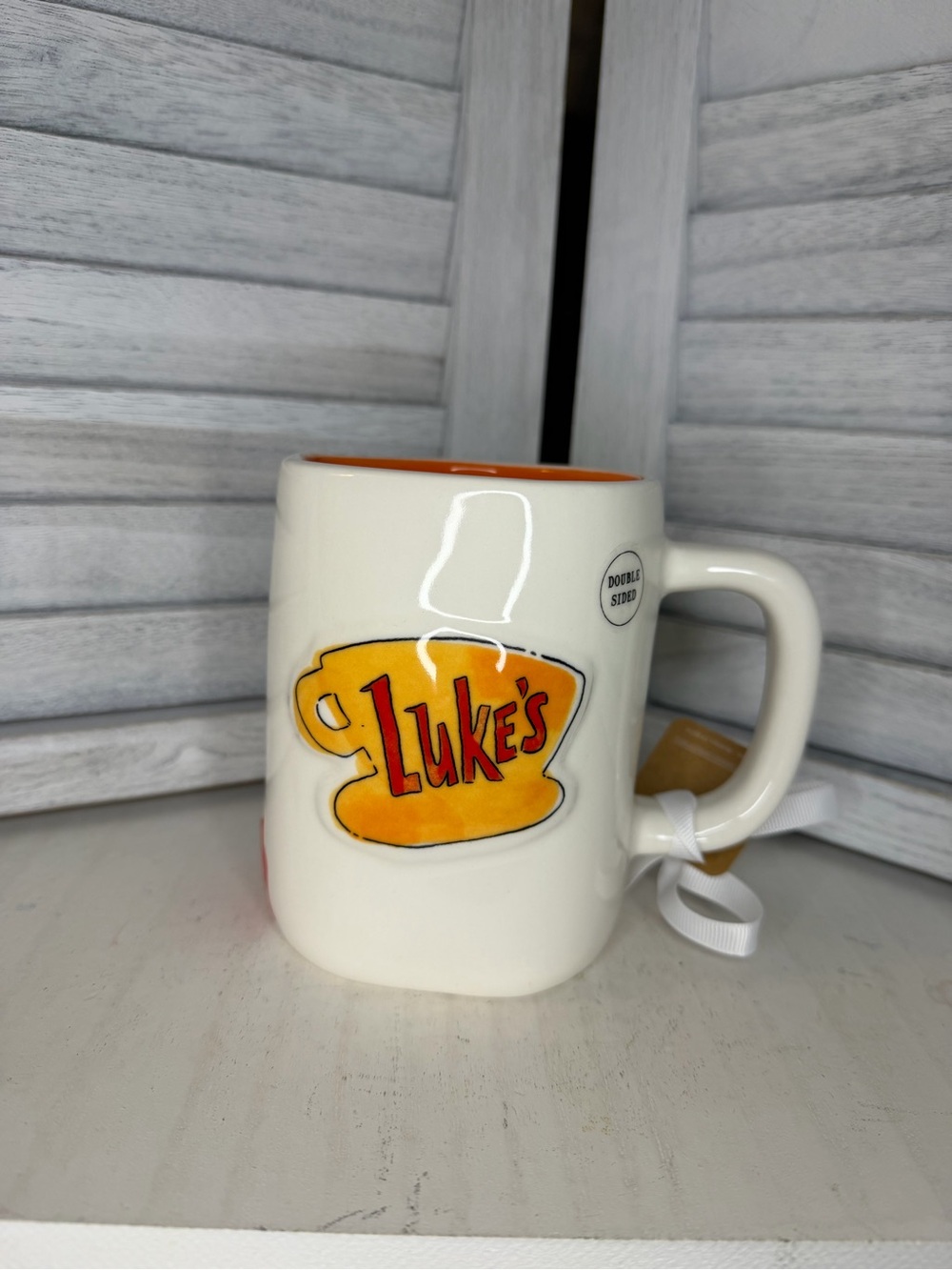Rae Dunn Cream Mug with Yellow Cup Graphic and Orange Interior